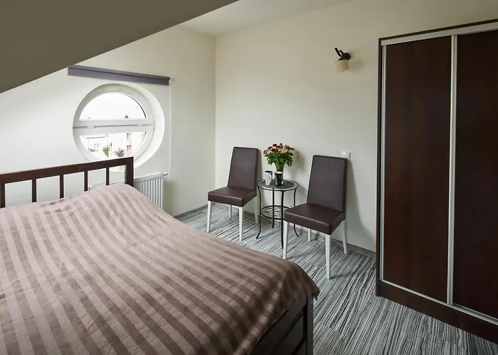 Quarto em Acomodações Particulares Gracja *